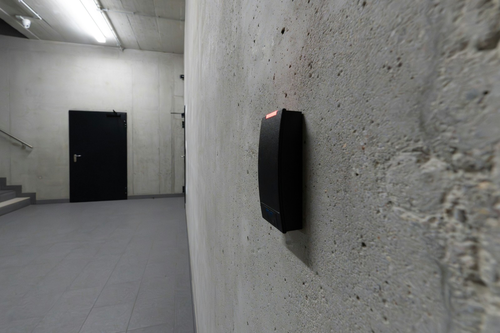 Card access reader mounted at a building entrance